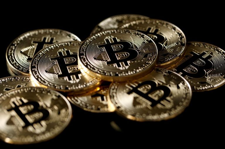 Bitcoin slides below $6,000; half its value lost in 2018