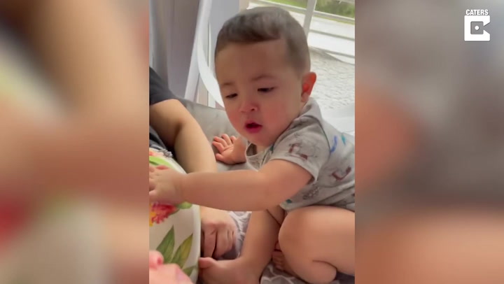 Watch: Toddler gags every time he looks at newborn brother