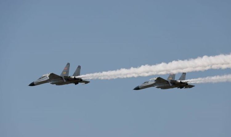 War fears explode as China sends 19 fighter jets into Taiwan airspace – island on alert