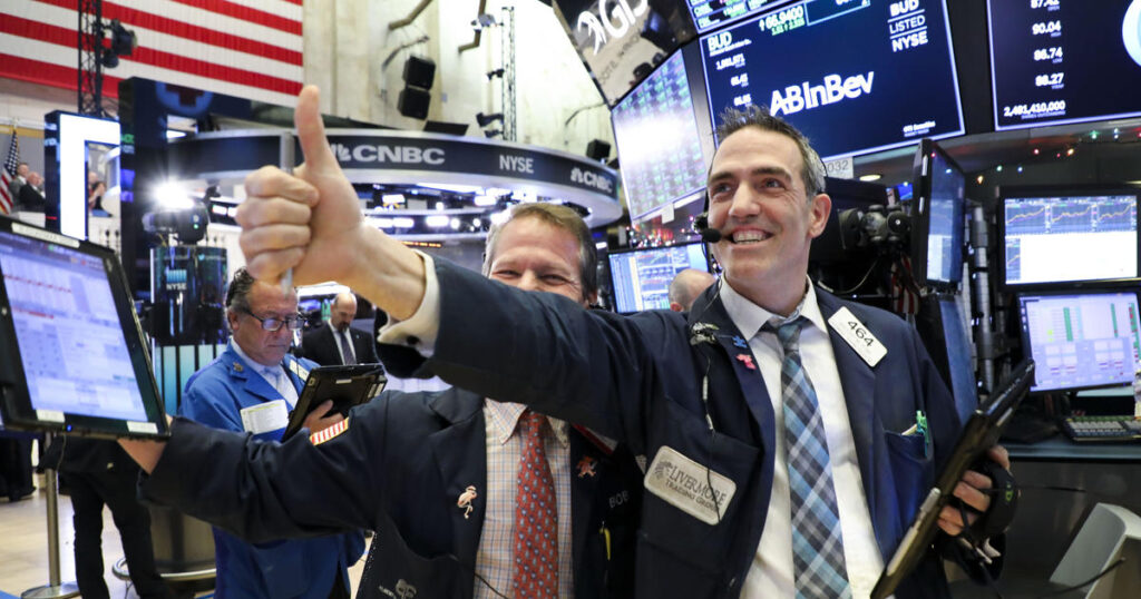 Dow stock index closes above 36,000 points for first time – CBS News