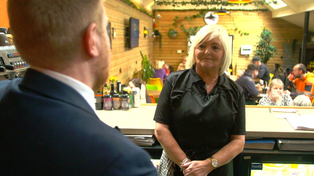 Swansea café owner needs to spend £15,000 a month ‘before buying a sausage’ to keep business afloat | ITV News Wales