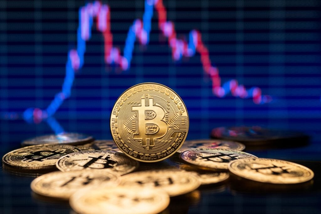 Bitcoin, Ethereum, Dogecoin Take A Siesta After February Frenzy: Analyst Sees Apex Crypto Pulling Back To $46K If Correction Occurs – Benzinga
